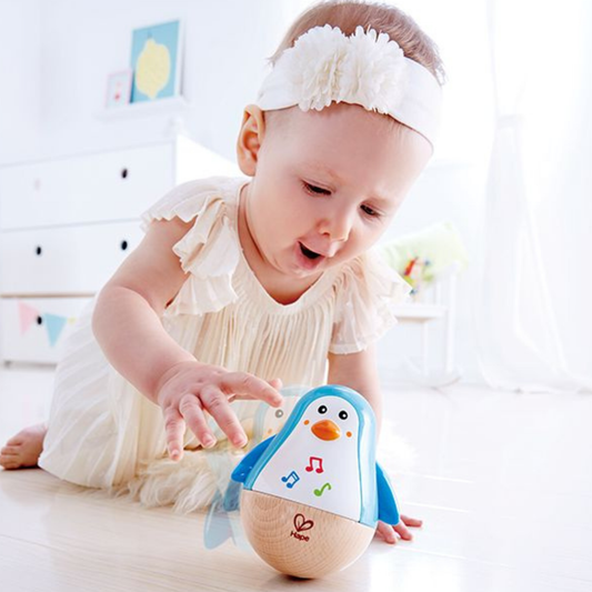 Hape muzikale wiebel pinguïn